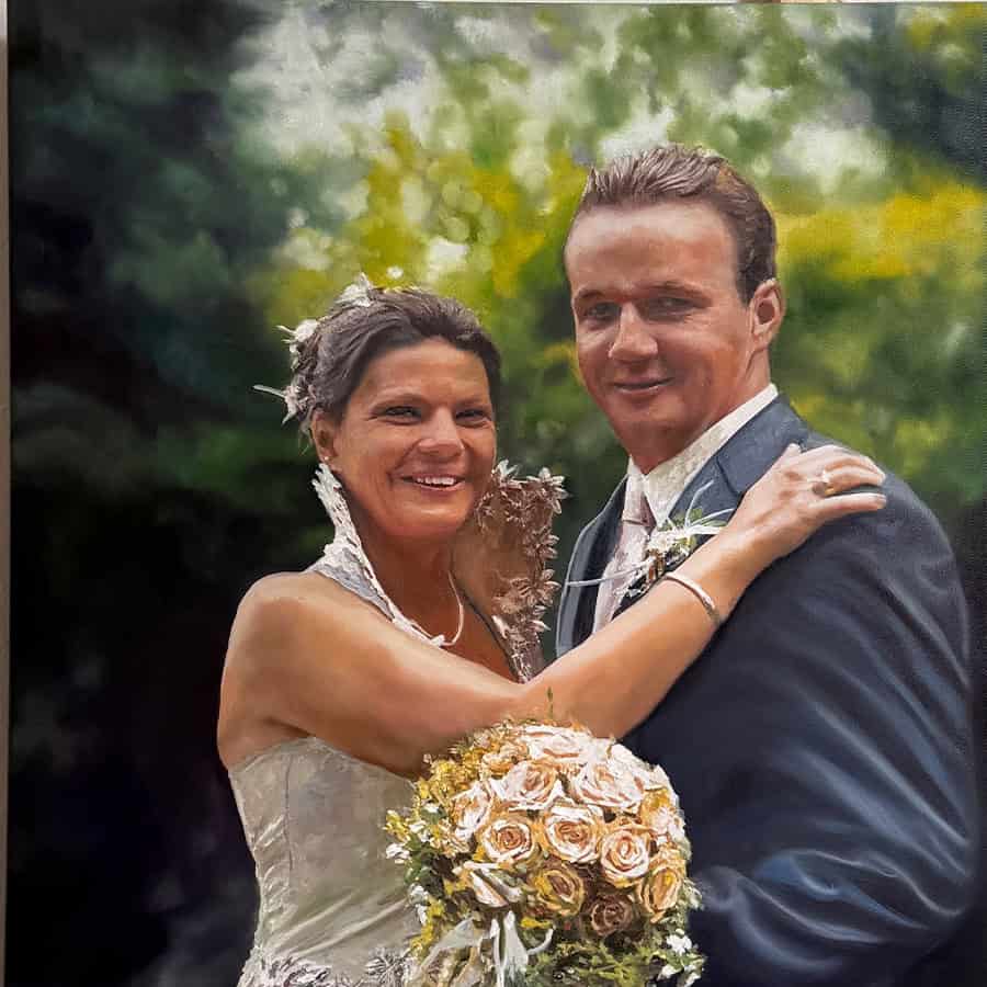 Wedding portrait painting of a bride and groom embracing, with the bride holding a bouquet of roses, set outdoors with lush green background.