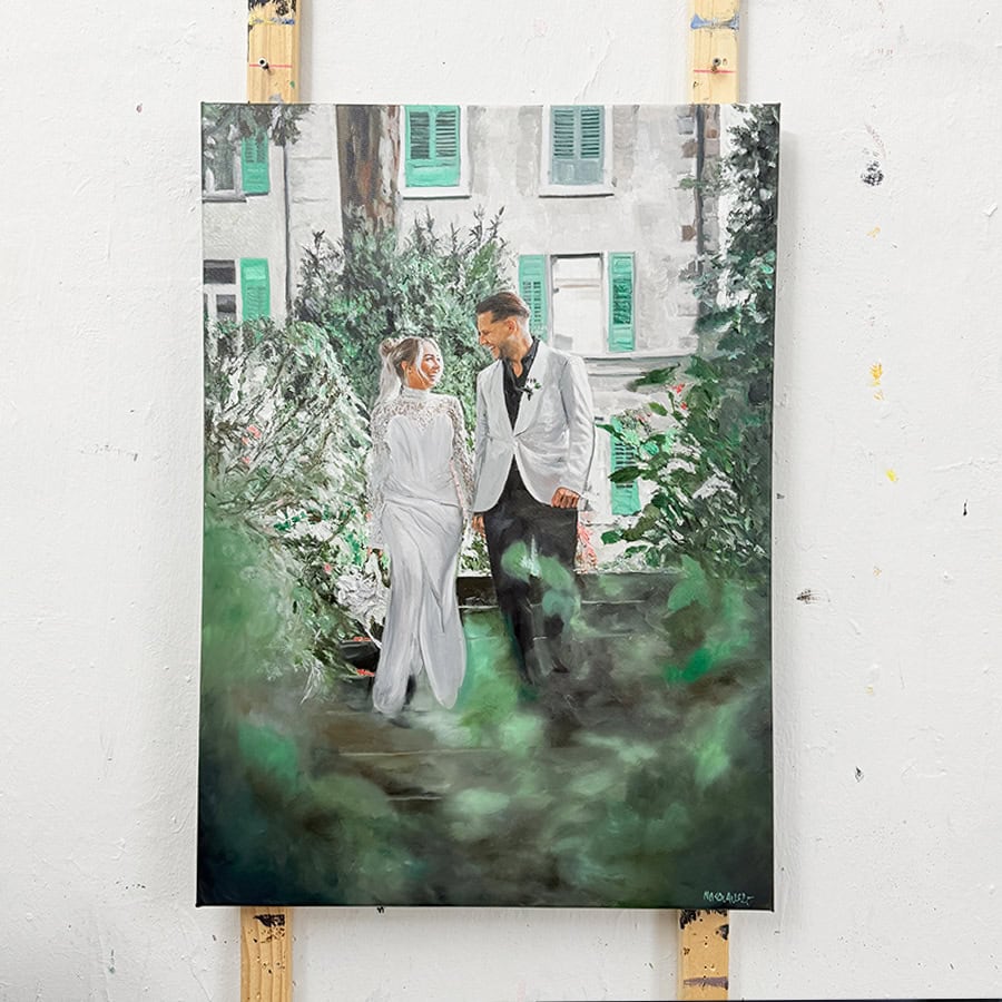 Wedding couple portrait painting by Nikolaus Kriese, showcasing a romantic scene with a bride and groom in elegant attire, surrounded by lush greenery and a charming building background.