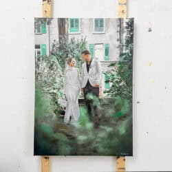 A detailed portrait painting of a bride and groom in wedding attire, set outdoors with lush greenery and a building with green shutters in the background.